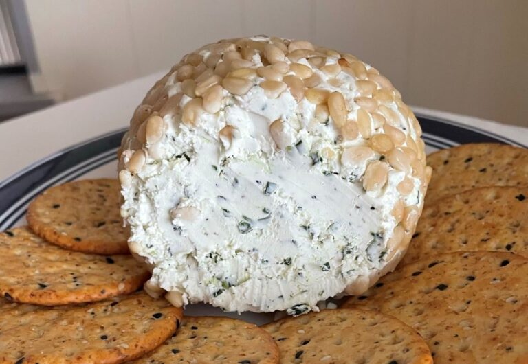 Image of herbed cheese ball with crackers.