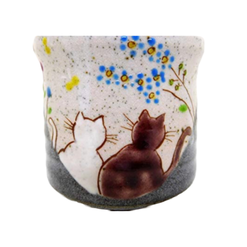 Image of pottery japanese tea cup with kittens and flowers painted on it