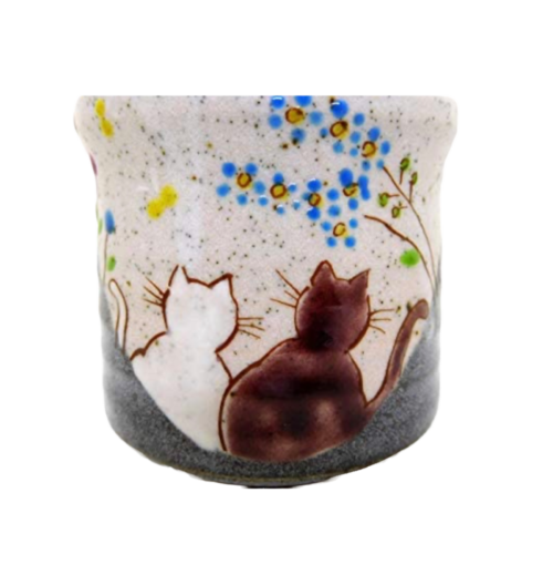 Image of pottery japanese tea cup with kittens and flowers painted on it