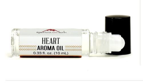 Image of roll-on bottle with heart aroma oil.